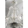 Lustre à six bras de lumière et deux appliques en cristal signé Baccarat, XXème 