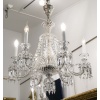 Lustre à six bras de lumière et deux appliques en cristal signé Baccarat, XXème 