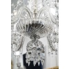 Lustre à six bras de lumière et deux appliques en cristal signé Baccarat, XXème 